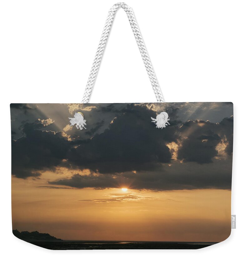 Sun Weekender Tote Bag featuring the photograph Sunrise over The Isle of Wight by Clayton Bastiani