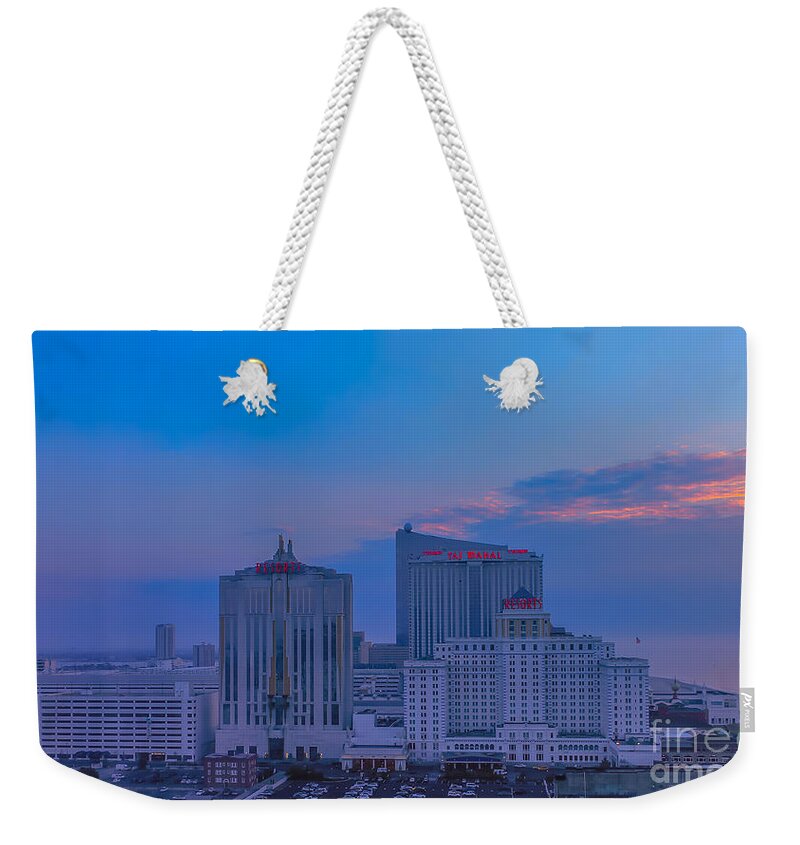 Urban Weekender Tote Bag featuring the photograph Sunrise over Trump Tower in Atlantic City by Claudia M Photography