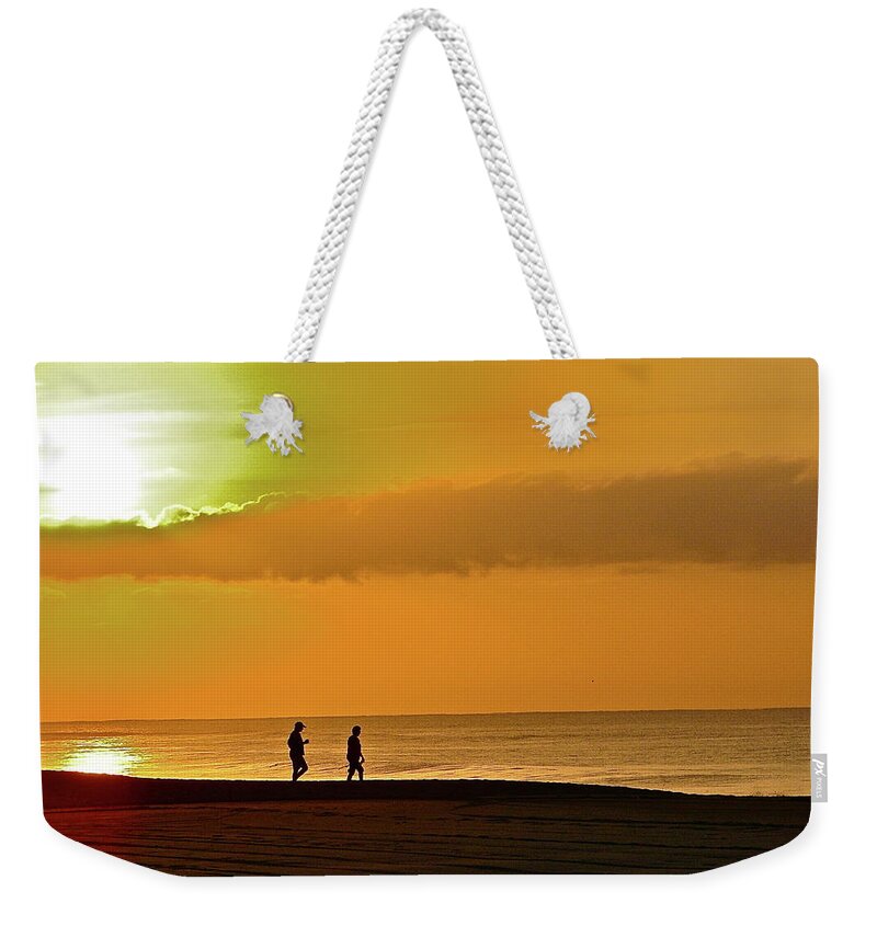 Beach Weekender Tote Bag featuring the photograph Sunrise Stroll by Diana Hatcher