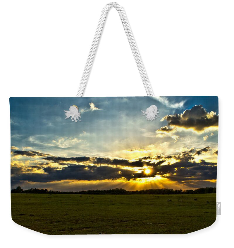 Scenic Weekender Tote Bag featuring the photograph Sunset Across Open Field by Christopher Holmes