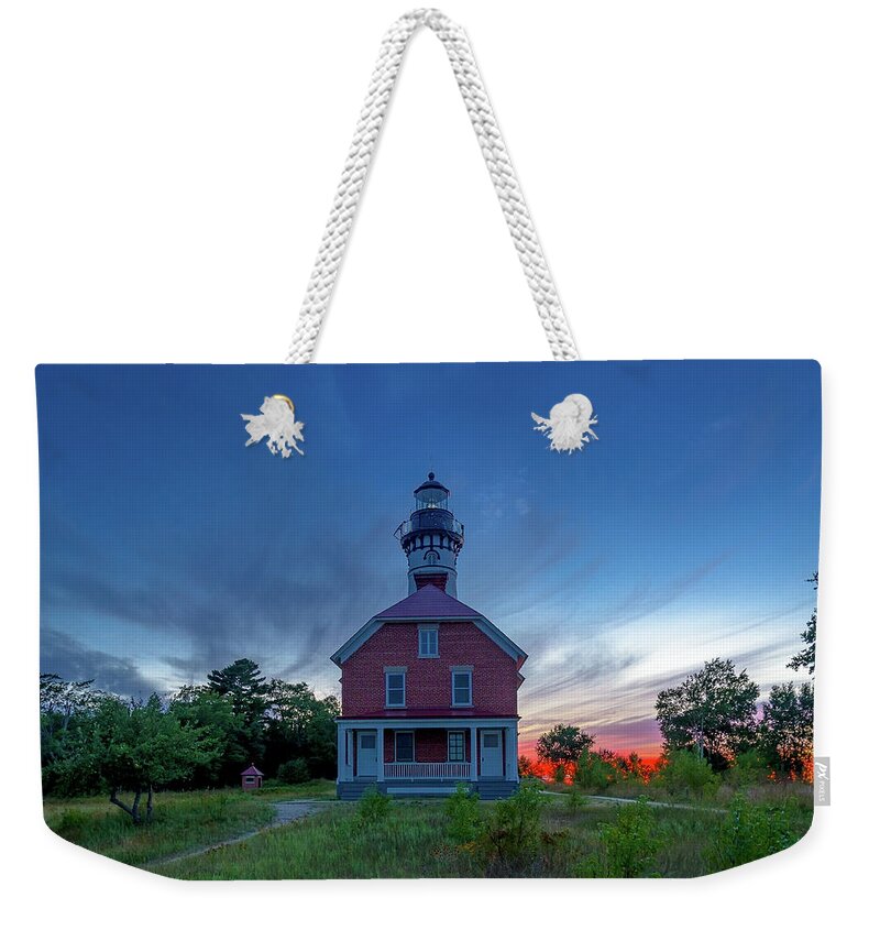 Au Sable Point Weekender Tote Bag featuring the photograph Sunset at Au Sable Point Lighthouse by Gary McCormick