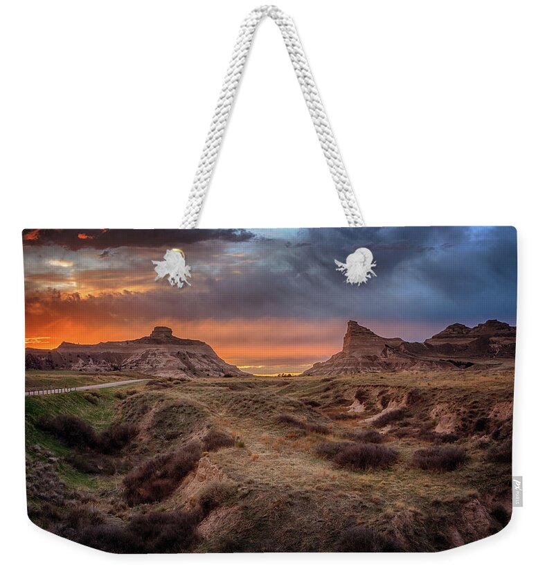 Scotts Bluff Weekender Tote Bag featuring the photograph Sunset at Scotts Bluff by Susan Rissi Tregoning