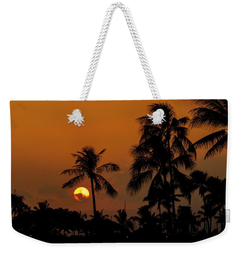Waikiki Weekender Tote Bag featuring the photograph Sunset in Waikiki by Jason Hughes