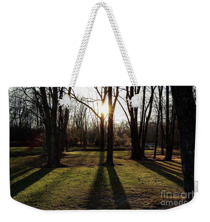 Sunset Weekender Tote Bag featuring the photograph Sunset by Les Greenwood