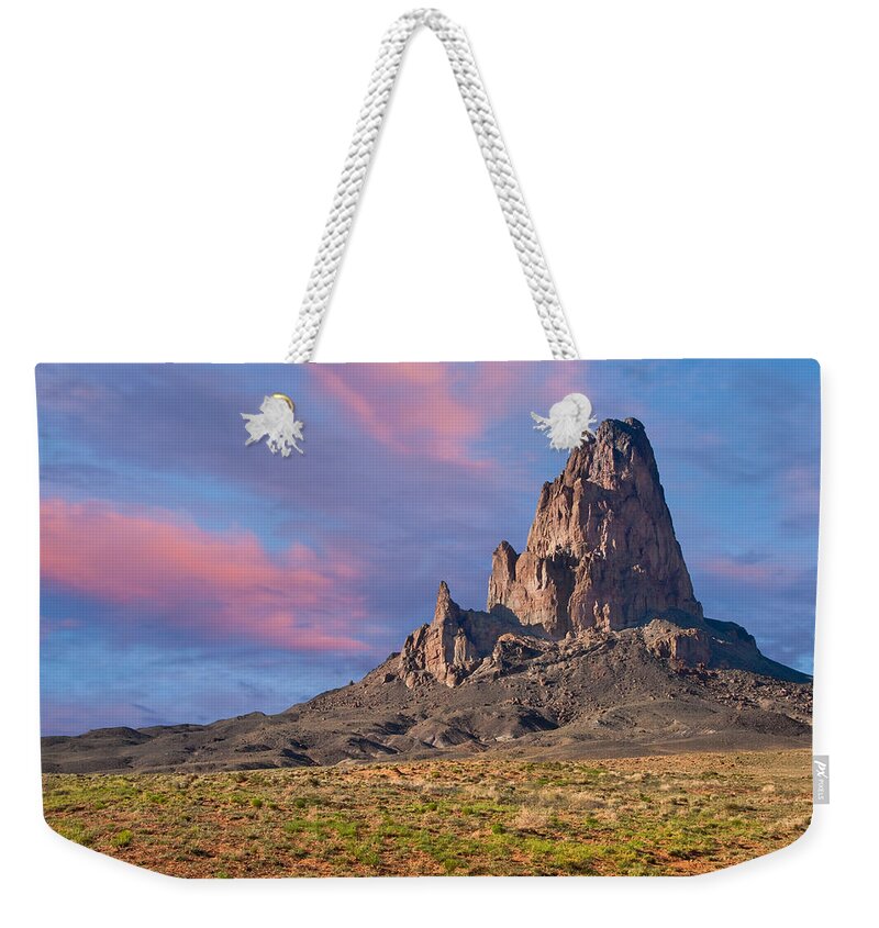 Arid Climate Weekender Tote Bag featuring the photograph Sunset on Agathla Peak by Jeff Goulden
