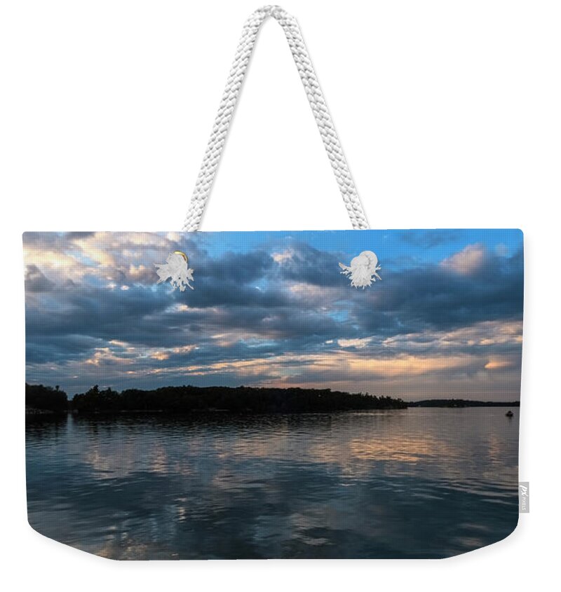 St Lawrence Seaway Weekender Tote Bag featuring the photograph Sunset On The River by Tom Singleton