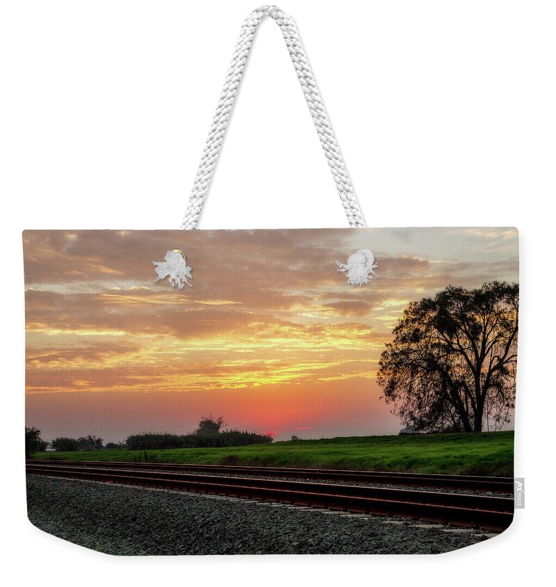 Railroad Weekender Tote Bag featuring the digital art Sunset on the Tracks by Terry Davis