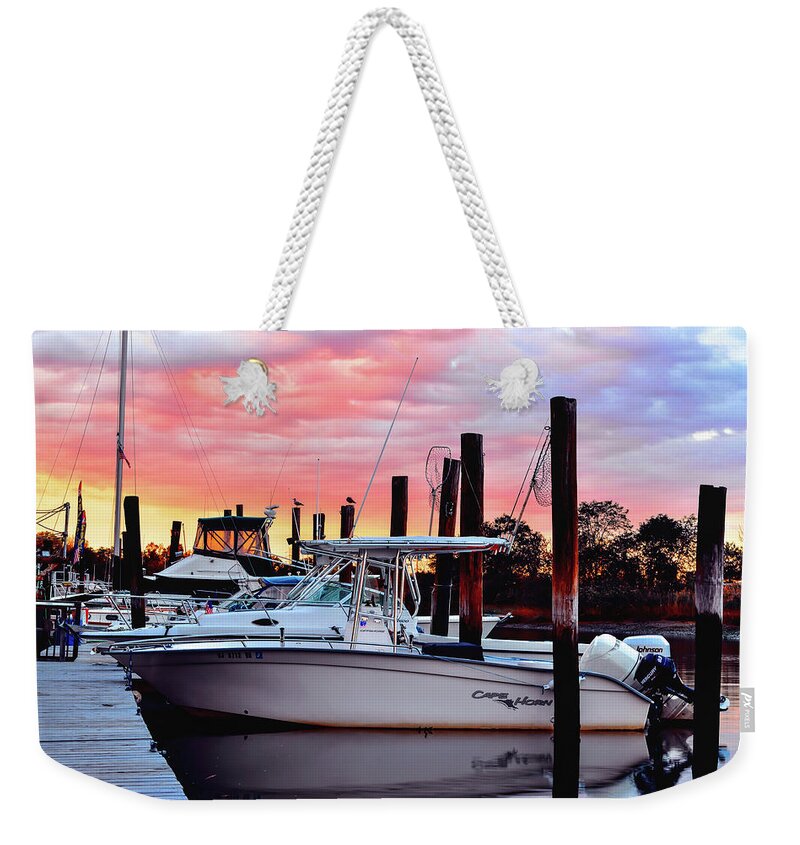 Boats Weekender Tote Bag featuring the photograph Sunset on the Water by Daniel Carvalho