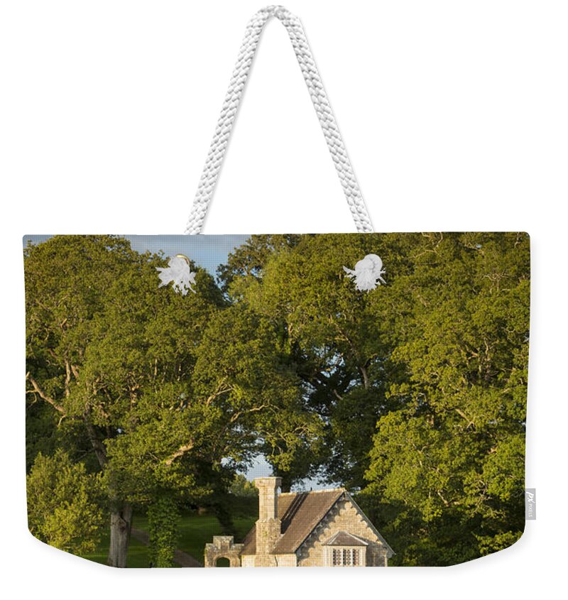 Boathouse Weekender Tote Bag featuring the photograph Sunset over Crom Castle Boathouse II by Brian Jannsen