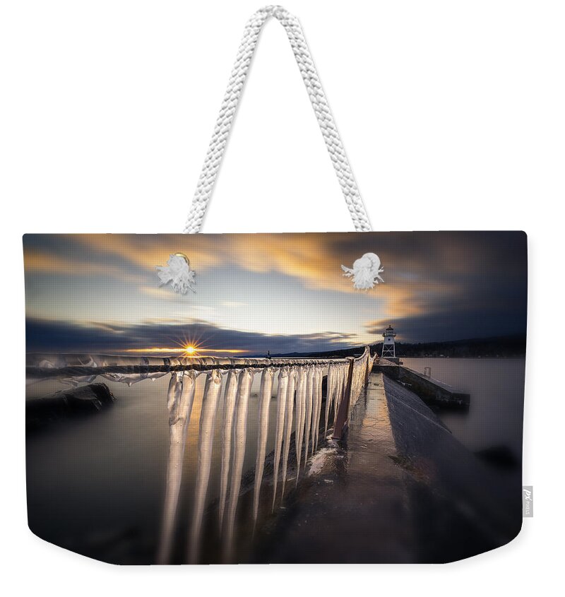 Canada Weekender Tote Bag featuring the photograph Sunset over Grand Marais Lighthouse Breakwall by Jakub Sisak