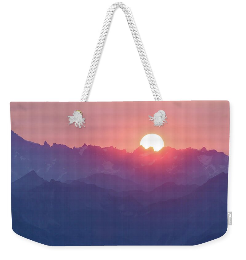 Sunset Weekender Tote Bag featuring the photograph Sunset over the Alps by Paul MAURICE