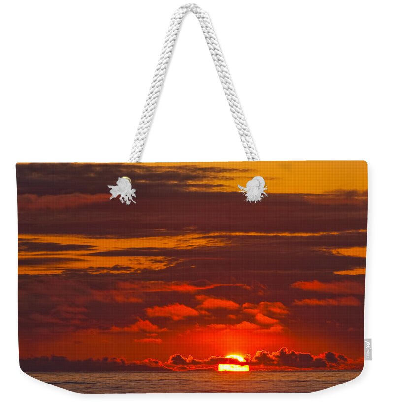 Beach Weekender Tote Bag featuring the photograph Sunset Over the Pacific Ocean by Jeff Goulden