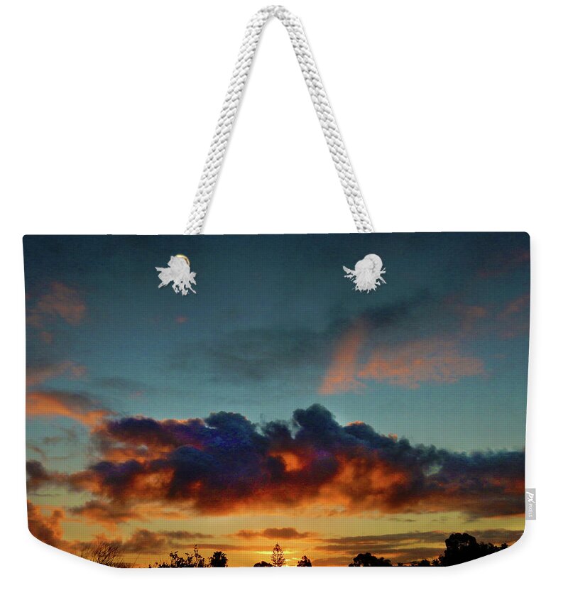 Sunset Weekender Tote Bag featuring the photograph Sunset Seep by Mark Blauhoefer