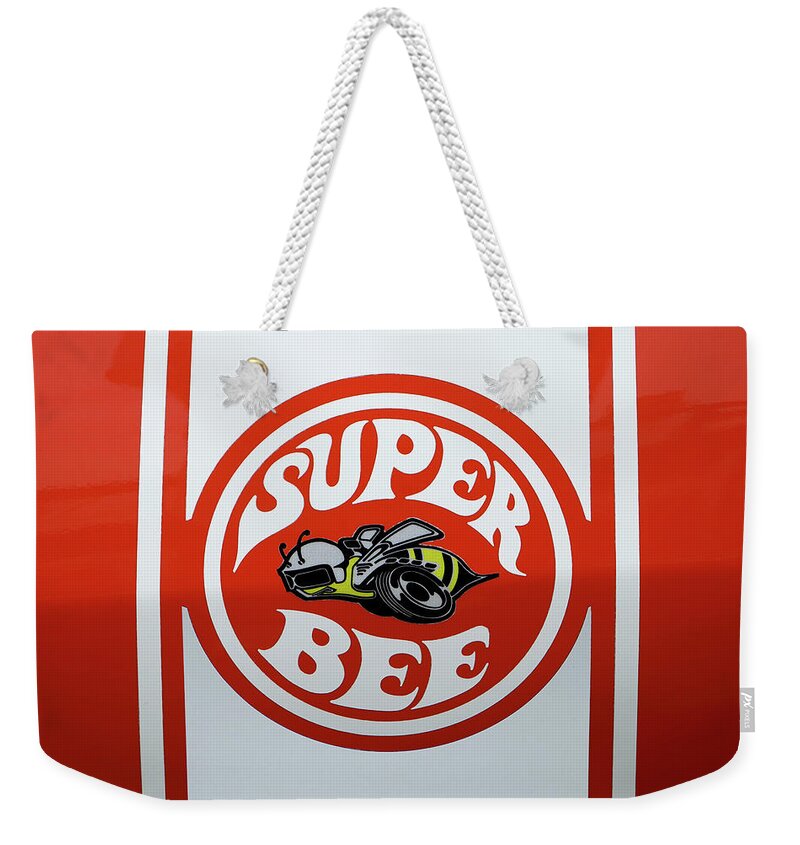 Dodge Weekender Tote Bag featuring the photograph Super Bee Emblem by Mike McGlothlen