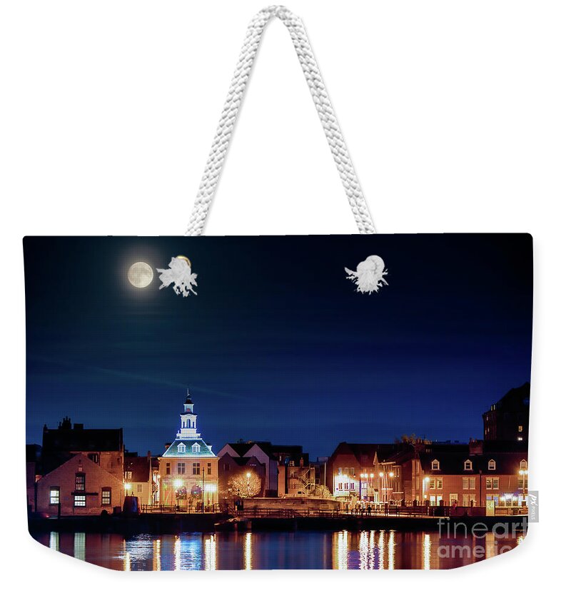 Super-moon Weekender Tote Bag featuring the photograph Supermoon rising over Norfolk town UK by Simon Bratt