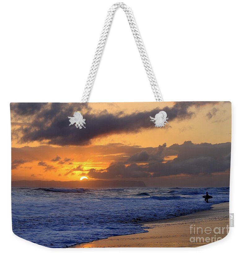 Kauai Weekender Tote Bag featuring the photograph Surfer at Sunset on Kauai Beach With Niihau on Horizon by Catherine Sherman