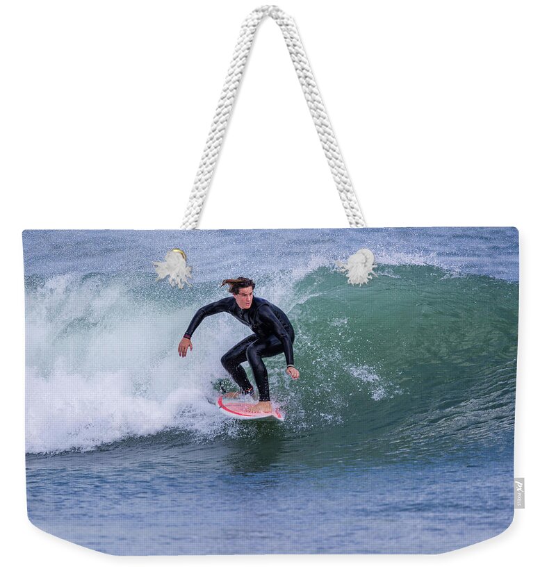 Surfer Weekender Tote Bag featuring the photograph Surfer Hits the Waves by Fran Gallogly