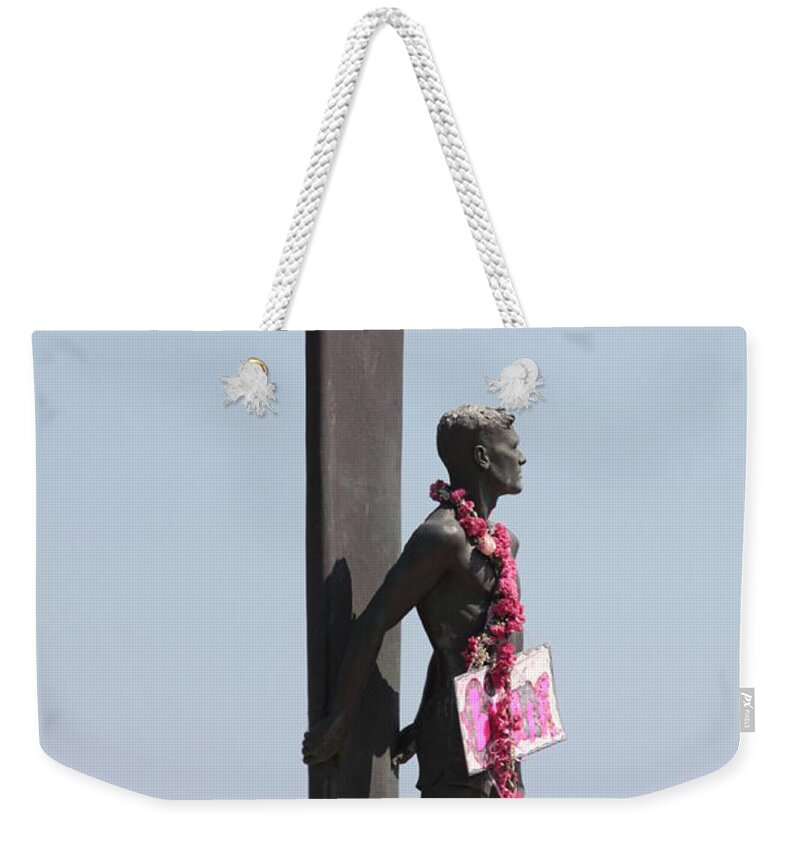 Surfer Statue Weekender Tote Bag featuring the photograph Surfer Statue by Carol Groenen