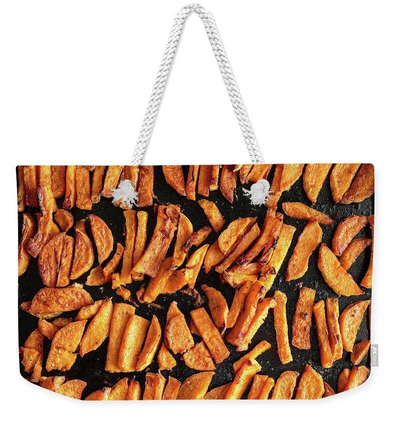 Sweet Weekender Tote Bag featuring the photograph Sweet potato chips by Ragnar Lothbrok