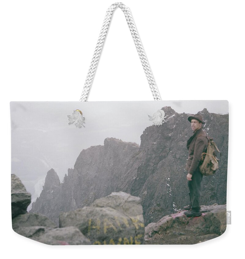 Fred Beckey Weekender Tote Bag featuring the photograph T-04701 Fred Beckey on Mt. Si 1958 by Ed Cooper Photography