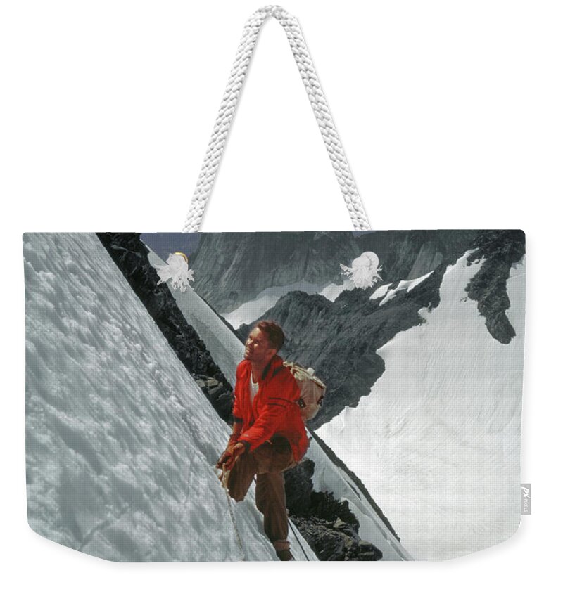 Eric Bjornstad Weekender Tote Bag featuring the photograph T-202707 Eric Bjornstad on Howser Peak by Ed Cooper Photography