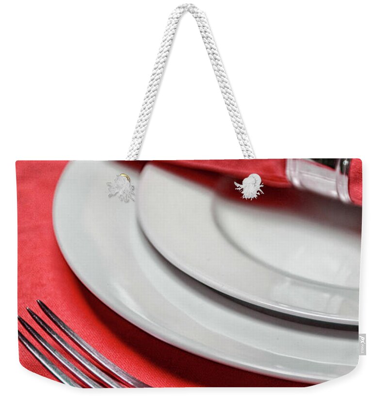 Bar Weekender Tote Bag featuring the photograph Table setting in red by Patricia Hofmeester