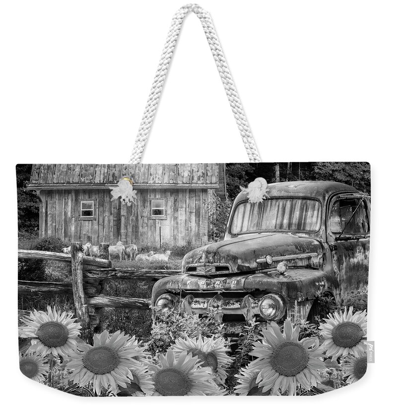 1940s Weekender Tote Bag featuring the photograph Take us for a Ride in the Sunflower Patch Black and White by Debra and Dave Vanderlaan