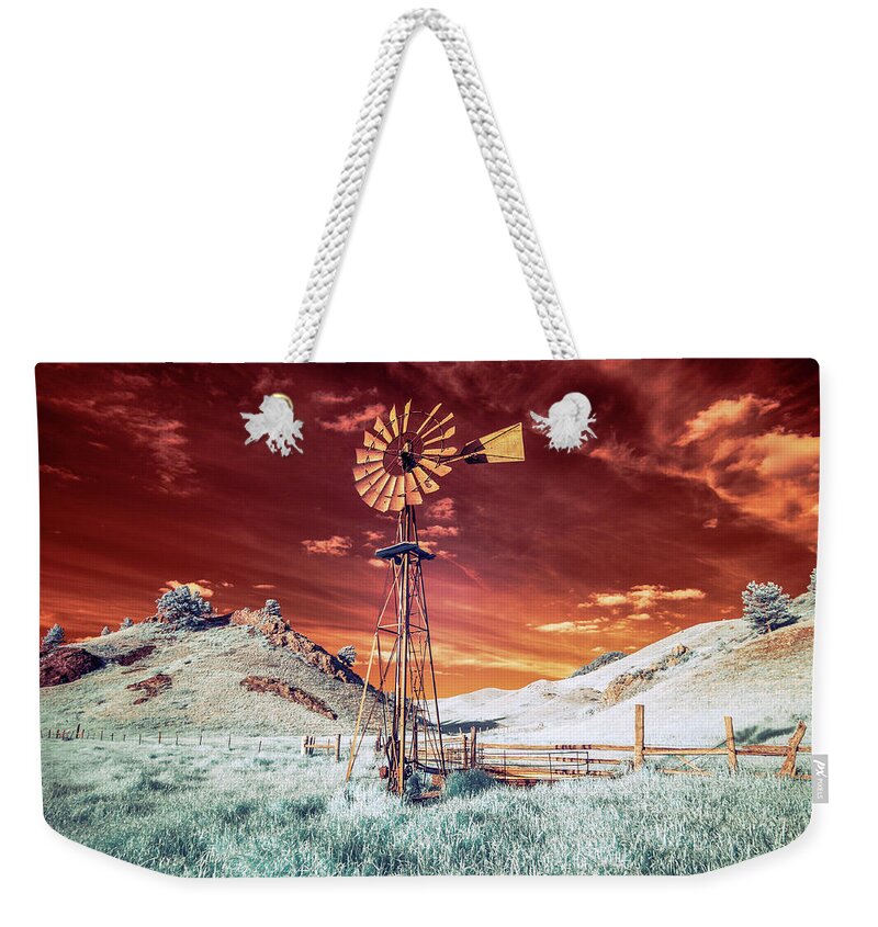 Windmill Weekender Tote Bag featuring the photograph Tarnished Windmill by Todd Klassy