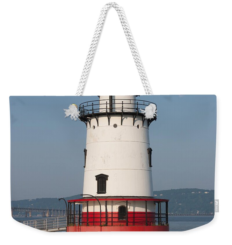 Clarence Holmes Weekender Tote Bag featuring the photograph Tarrytown Lighthouse and Waning Moon by Clarence Holmes