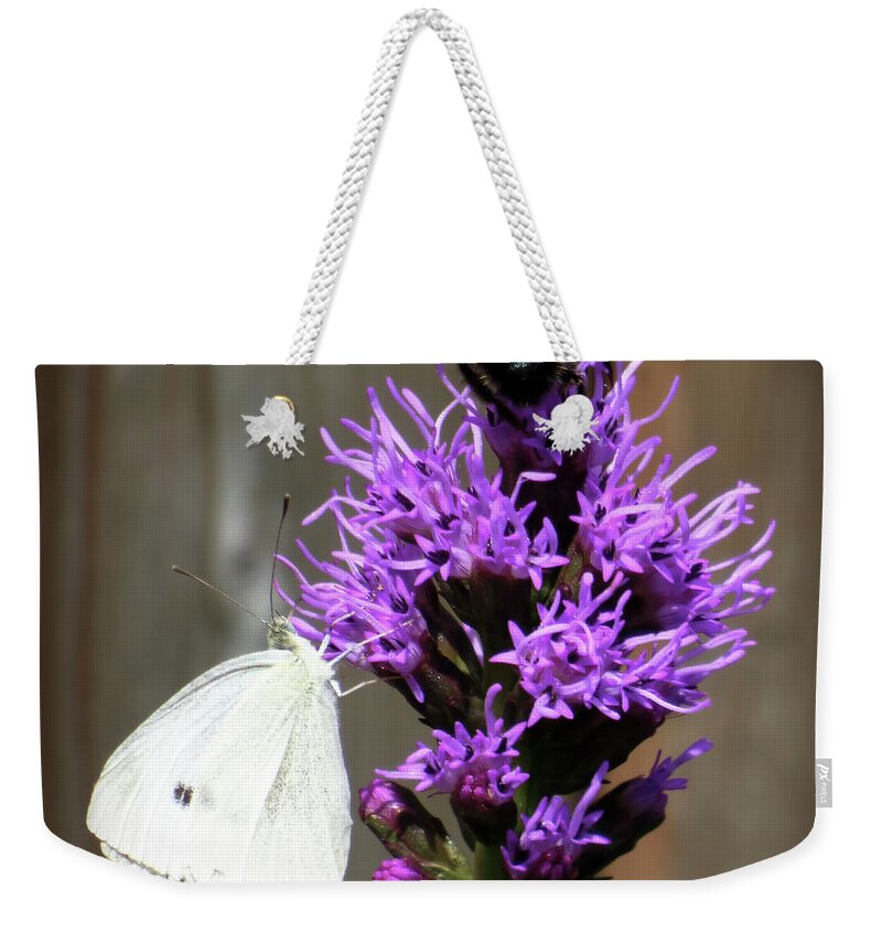Team Work Weekender Tote Bag featuring the photograph Team Work by Leslie Montgomery