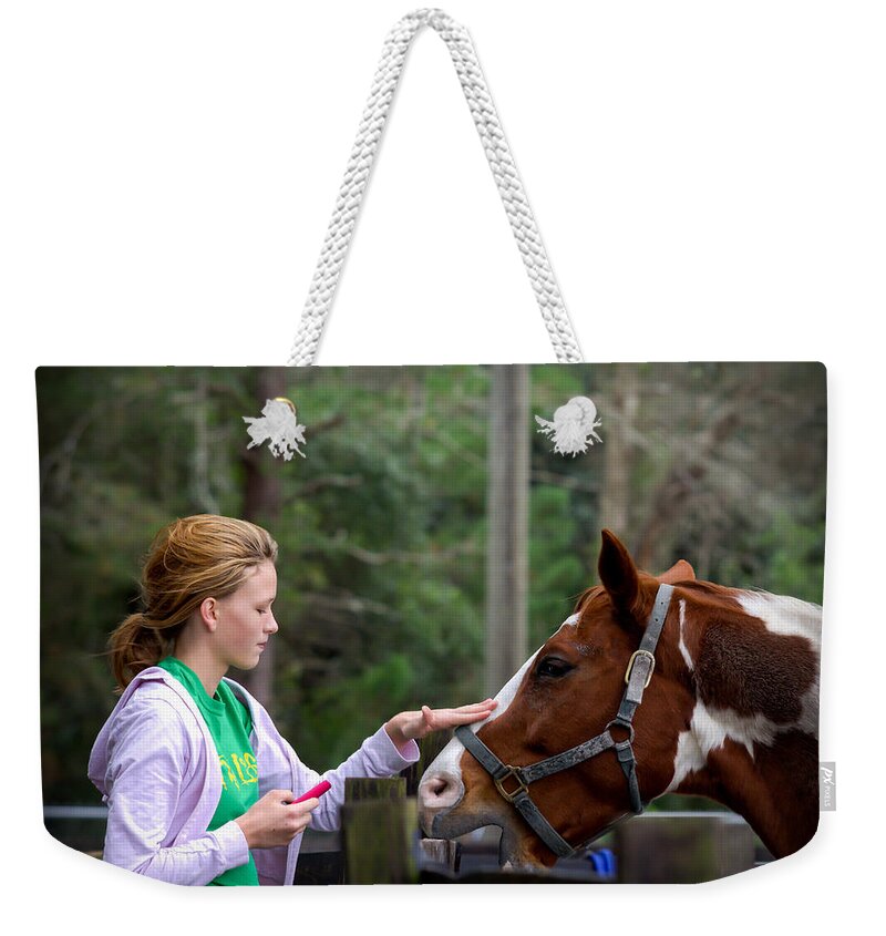 Horse Weekender Tote Bag featuring the photograph Tender Touch by Jaime Mercado
