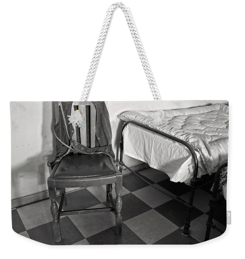 The Art Of Welfare Weekender Tote Bag featuring the photograph The Art of Welfare. Bed chair. by Elena Perelman