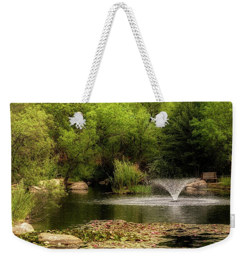 Trees Weekender Tote Bag featuring the photograph The BioPark Pond by Michael McKenney