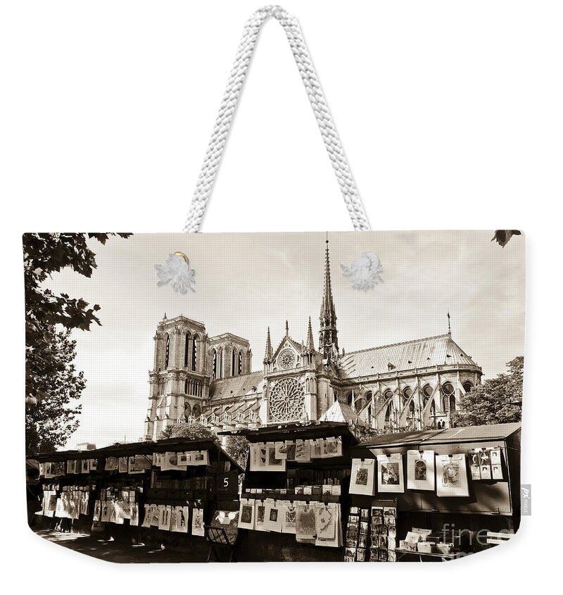 Seine Weekender Tote Bag featuring the digital art The Bouquinistes and Notre-Dame Cathedral by Perry Van Munster
