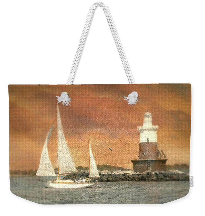 Lighthouse Weekender Tote Bag featuring the photograph The Chase by Diana Angstadt