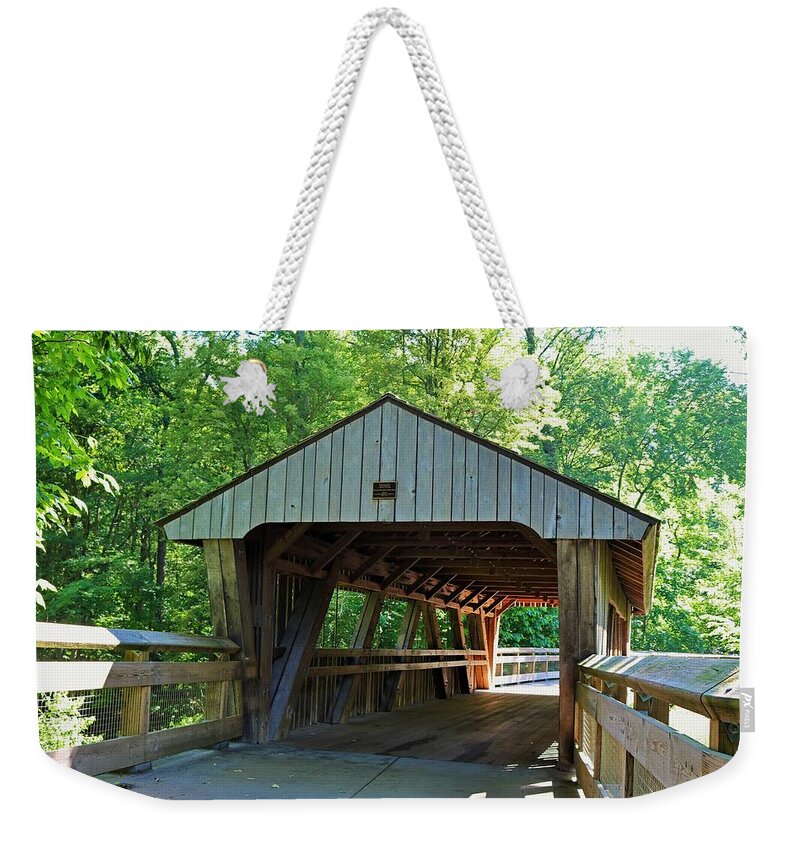 Wood Weekender Tote Bag featuring the photograph The Covered Bridge at Wildwood by Michiale Schneider