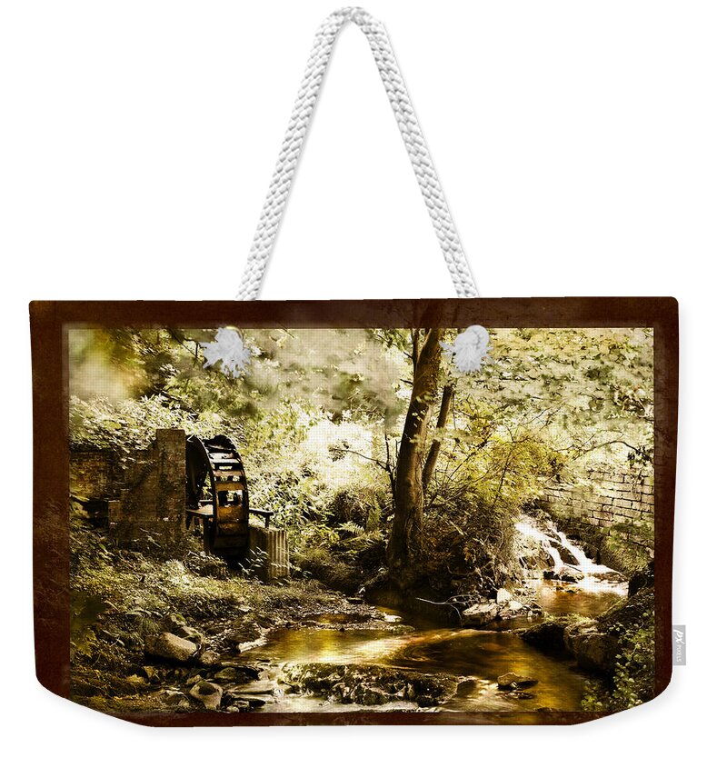 Watermill Weekender Tote Bag featuring the photograph The Forgotten Watermill Wheel by Mal Bray