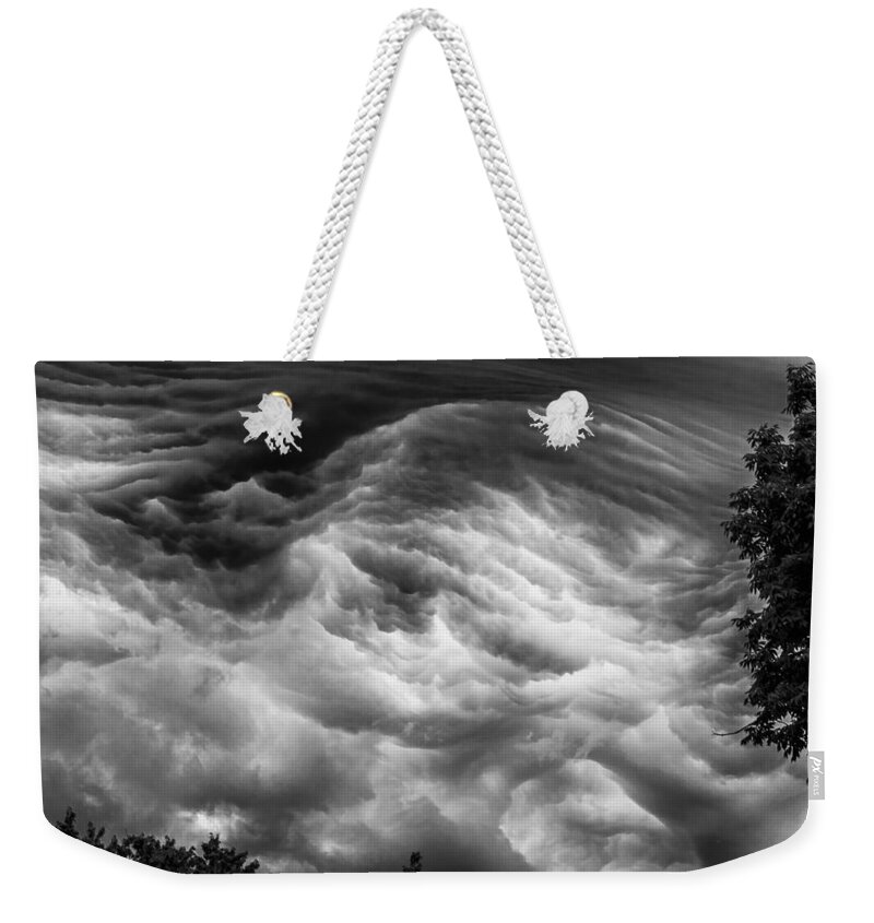 Storm Clouds Weekender Tote Bag featuring the photograph The gateway.. by Charles McCleanon