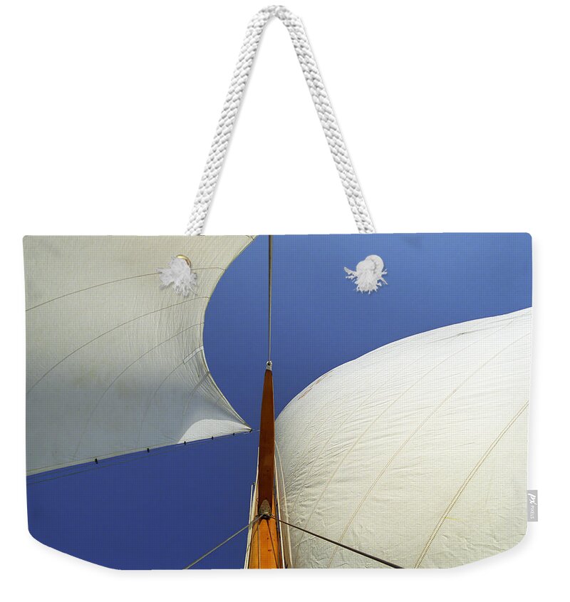 Sailing Weekender Tote Bag featuring the photograph The Genoa and Mainsail of a Classic Sailboat by John Harmon