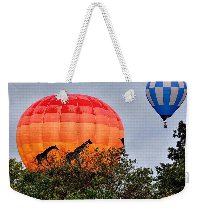 Giraffes Weekender Tote Bag featuring the photograph The Giraffes Are Coming by Steve Brown