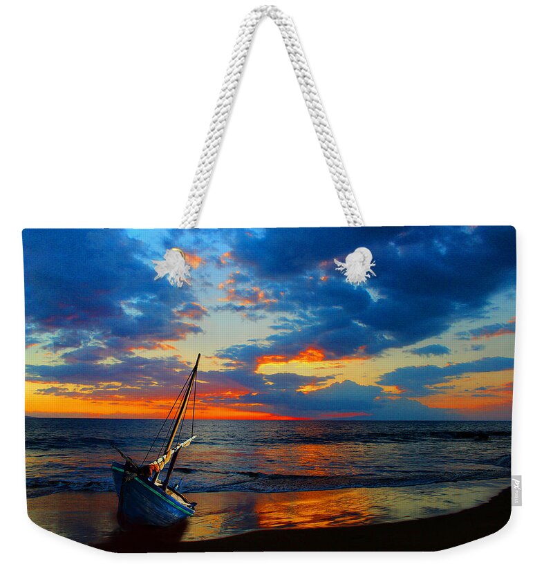 Shipwreck Weekender Tote Bag featuring the photograph The Hawaiian Sailboat by Michael Rucker