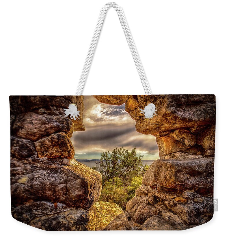 Chriscousins Weekender Tote Bag featuring the photograph The Hole in The Wall by Chris Cousins