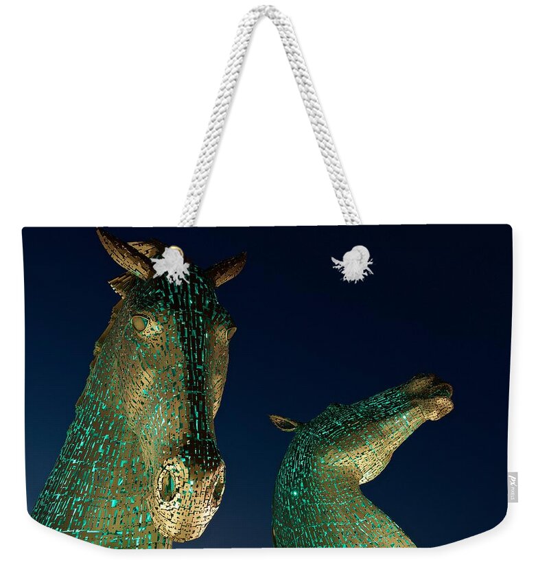Kelpies Weekender Tote Bag featuring the photograph The Kelpies lit Green by Stephen Taylor