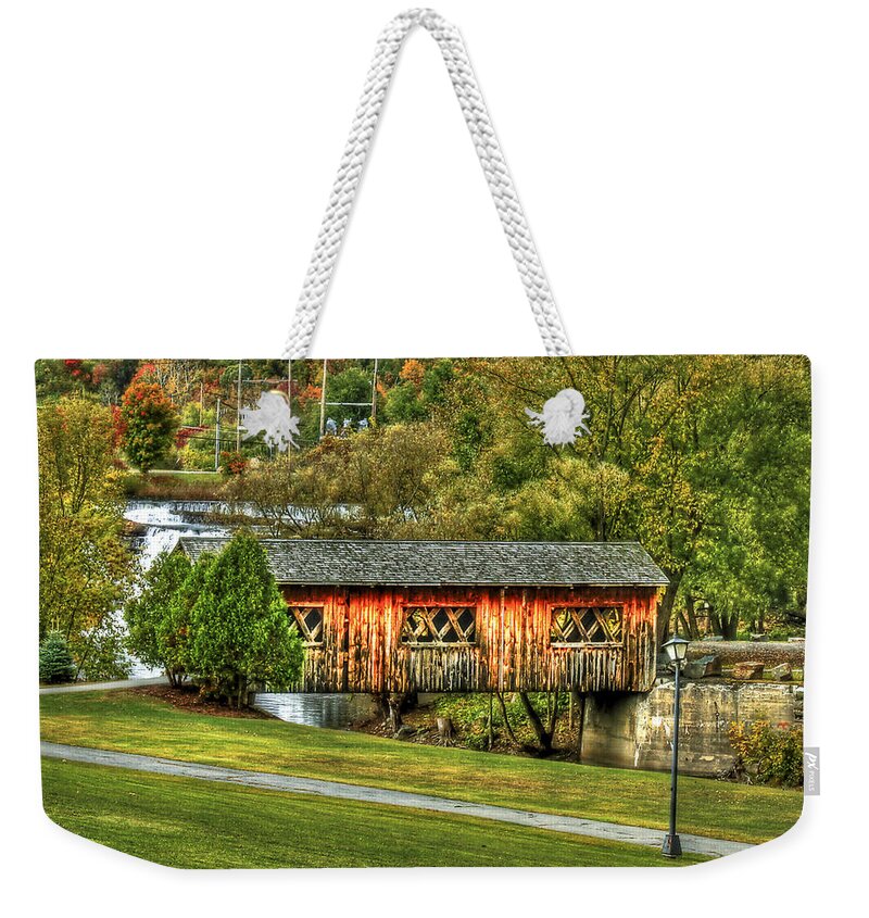 Covered Bridge Weekender Tote Bag featuring the photograph The Kissing Bridge by Evelina Kremsdorf