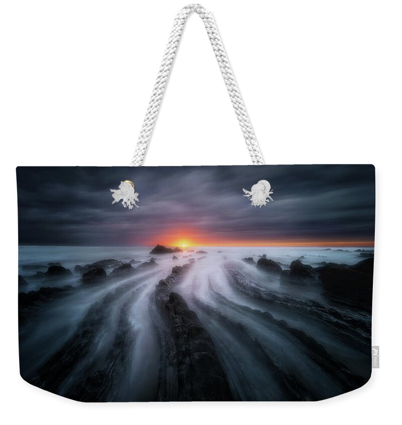 Rock Weekender Tote Bag featuring the photograph The last Sigh by Mikel Martinez de Osaba