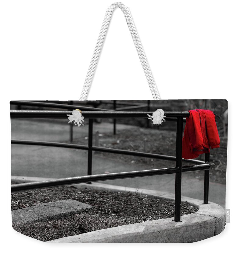 Black And White Weekender Tote Bag featuring the photograph The Lost Red Jacket by Dennis Dame