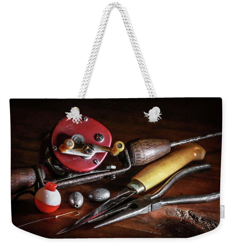 Fishing Weekender Tote Bag featuring the photograph The Lure Of Fishing by Ray Congrove