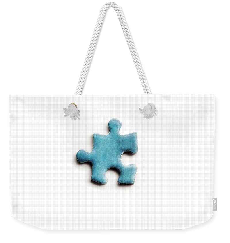 Puzzle Weekender Tote Bag featuring the photograph The missing piece by Micah Offman