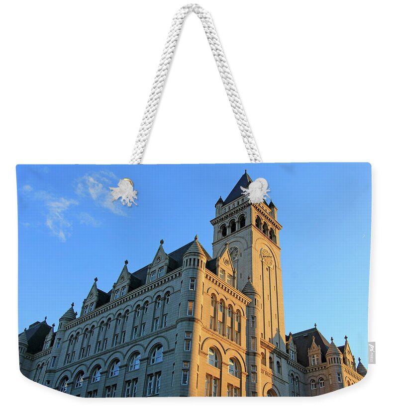 Old Weekender Tote Bag featuring the photograph The Old Post Office But Not Its Tower Is Now A Trump Hotel by Cora Wandel