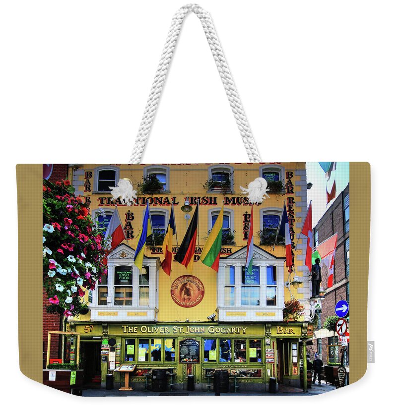 Eueipe Weekender Tote Bag featuring the photograph The Oliver St John Goarty bar Dublin by Tom Prendergast
